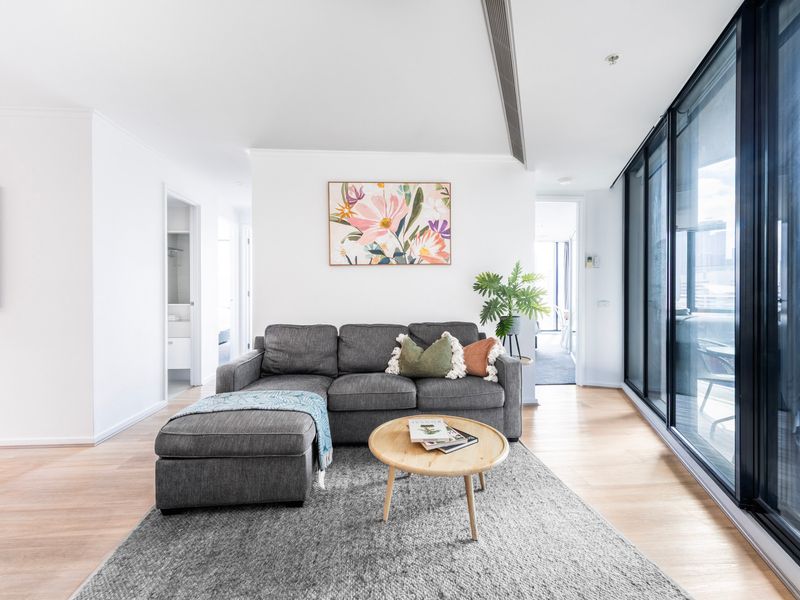 Sink into the comfort of a cozy, stylish sofa