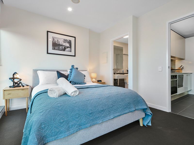 Master bedroom with queen bed, ensuite and built in robe