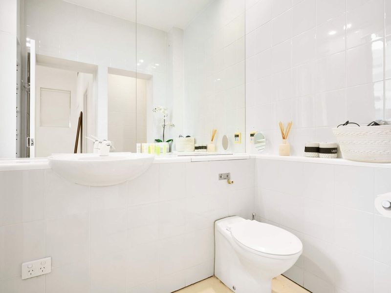 Clean and well-maintained bathroom with essential amenities provided