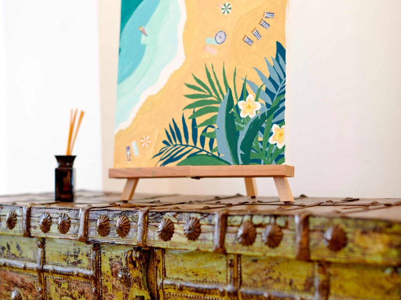 Artwork on Antique Cabinet