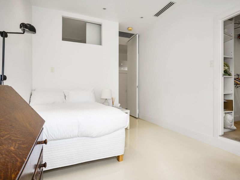 Spacious and minimalistic bedroom, perfect for a restful night