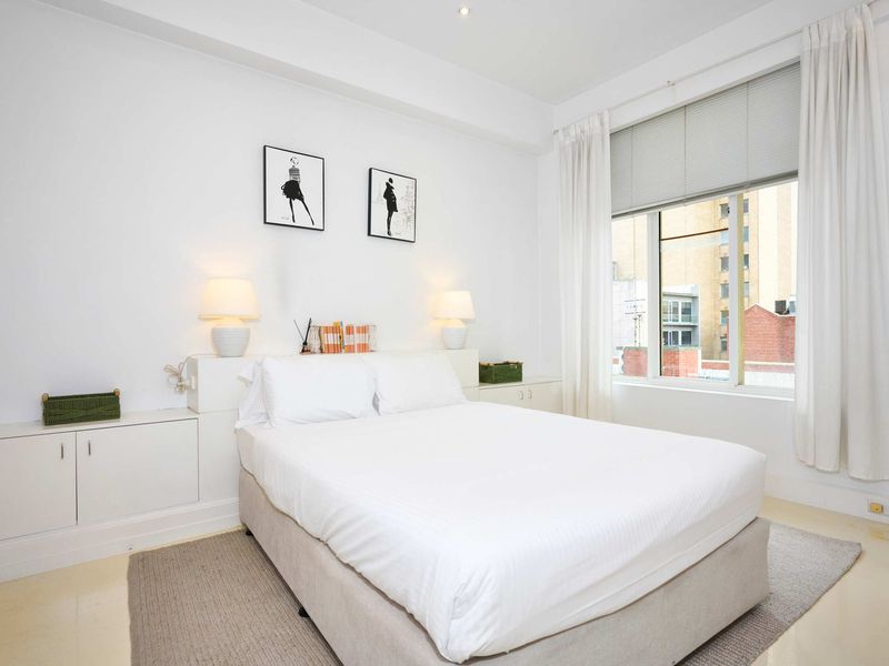 Comfortable Bedroom with City Views