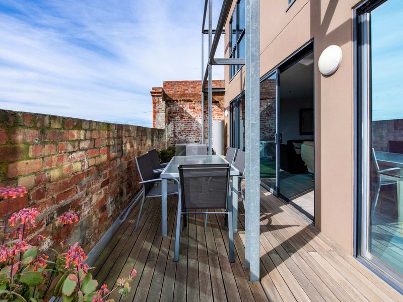 Private outdoor terrace perfect for dining and relaxing while enjoying the fresh air