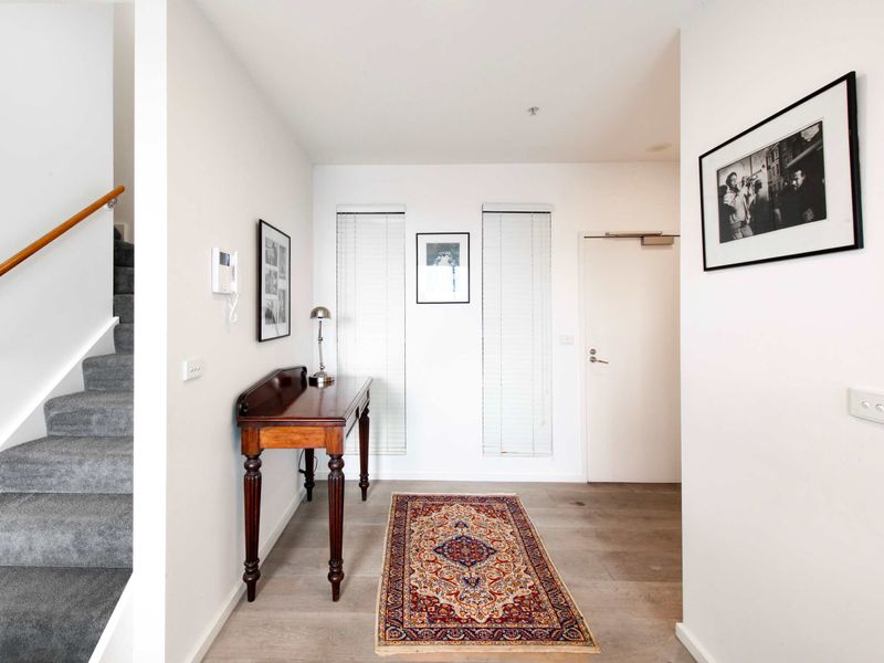 Welcoming entryway featuring classic decor and a touch of elegance.