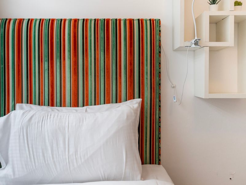 Playful feature wall adding colour and character to the sleeping space