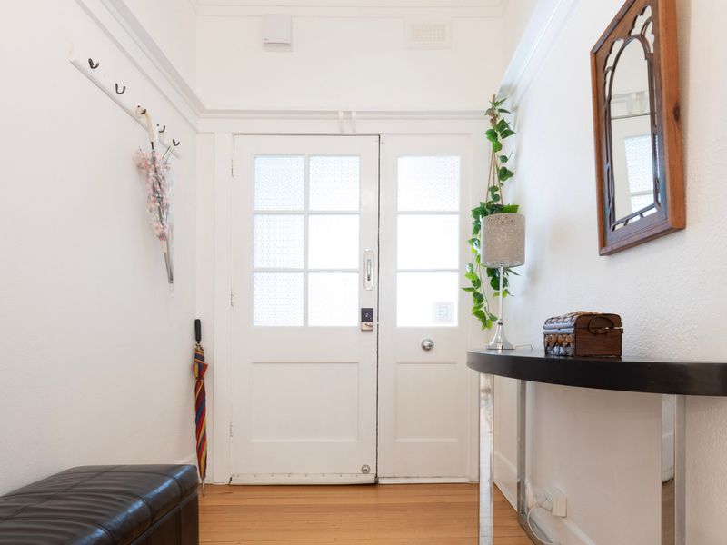 Welcoming entryway with natural light and practical layout