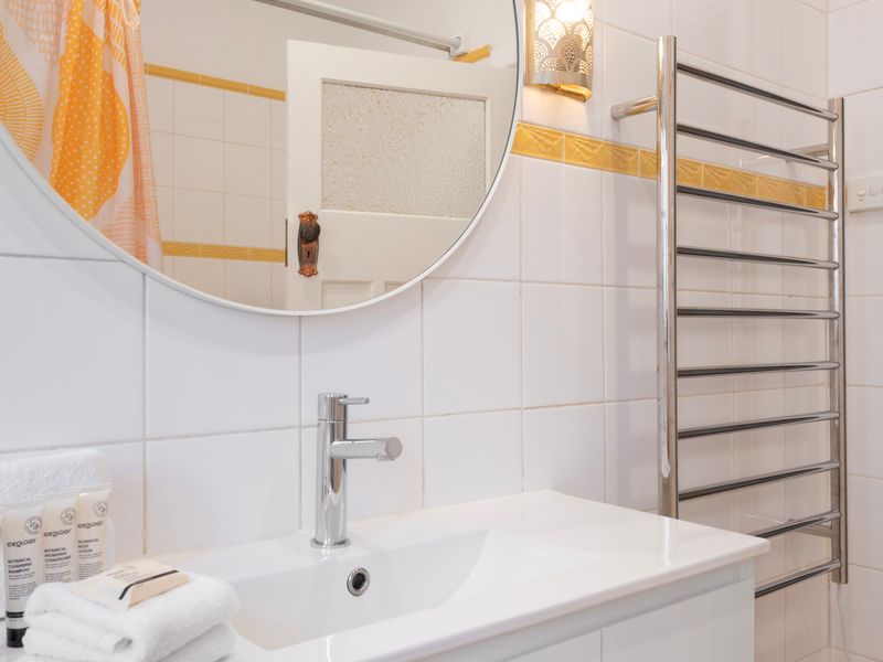 Compact bathroom vanity with chrome fittings and clean finishes