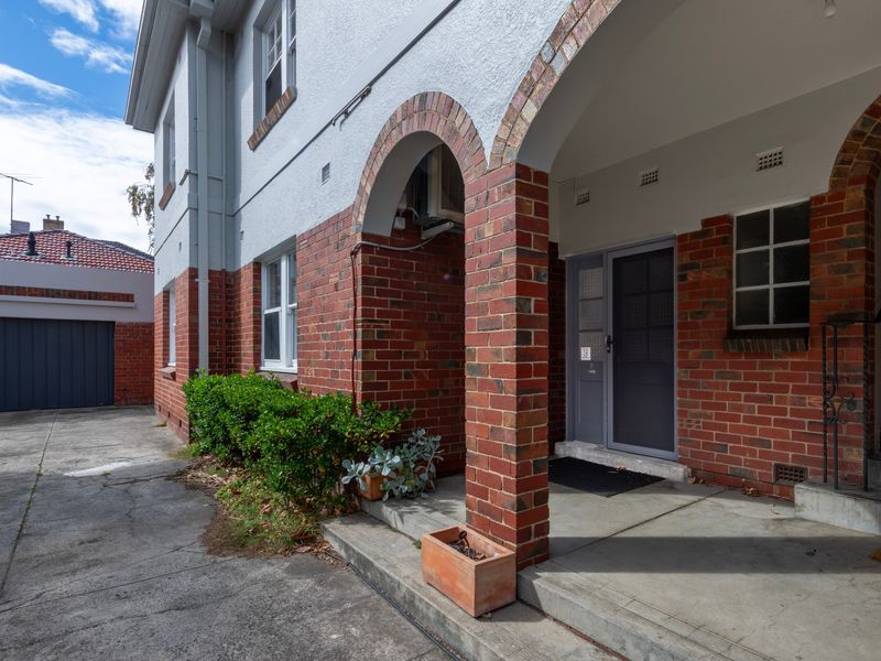 Charming building exterior with classic brick arches and character detail