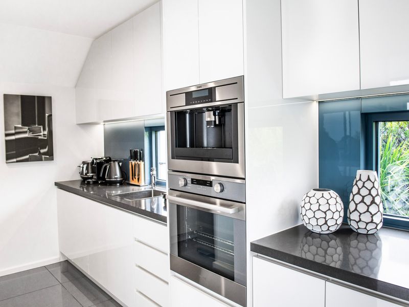 Functional kitchen layout with stylish appliances.