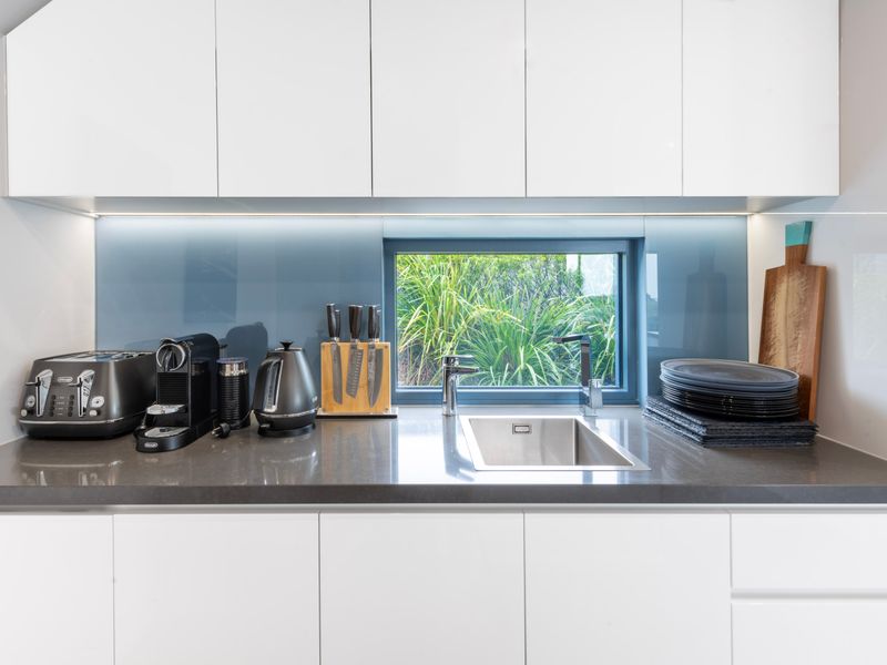 Modern kitchen with all the essentials and beautiful views.