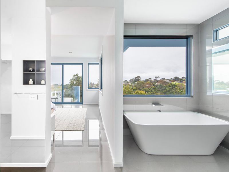 Designer bathroom featuring a freestanding bathtub