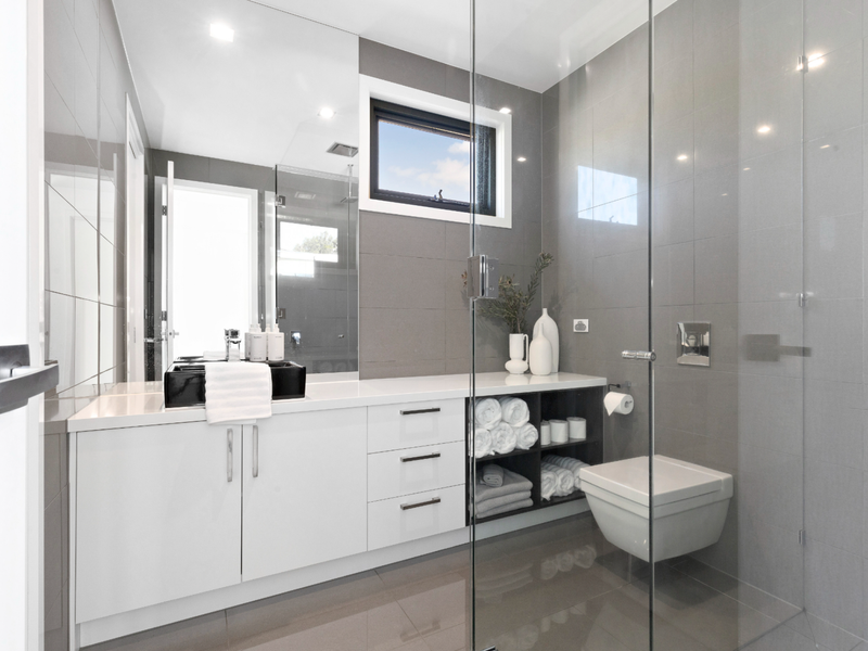 Stylish shared bathroom with walk-in shower