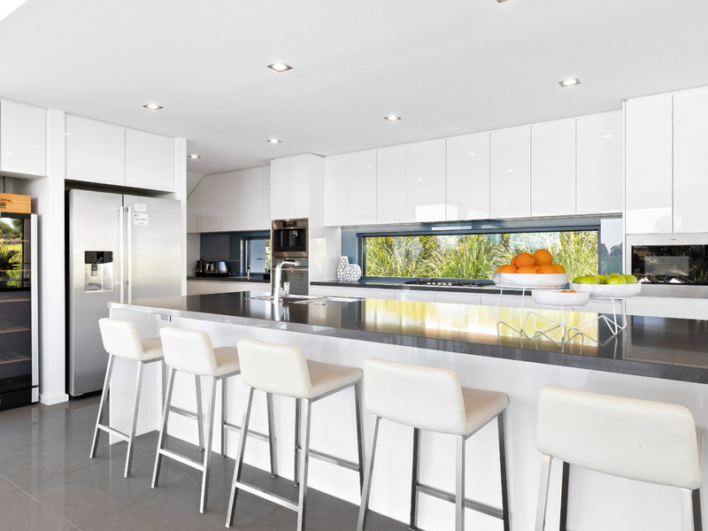 Bright, open kitchen with a stylish breakfast bar.
