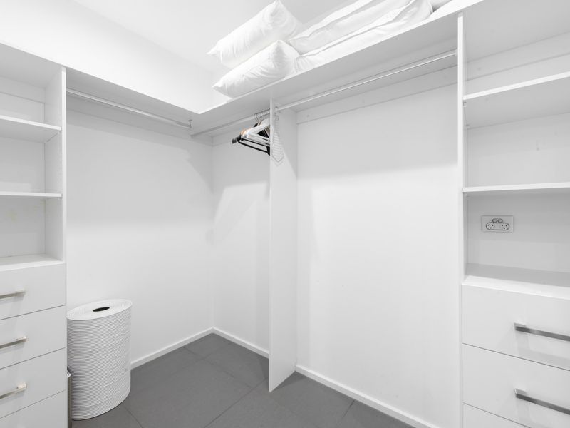 Spacious walk-in wardrobe with ample storage