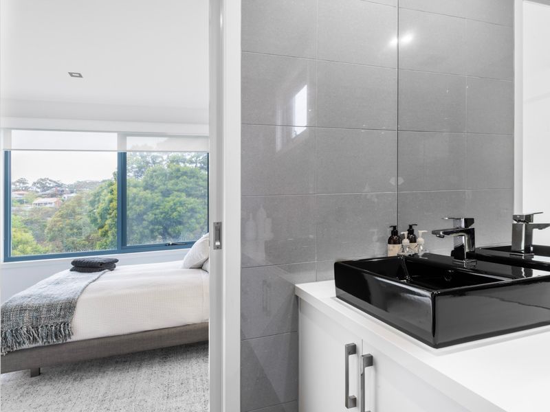 Modern vanity with clean lines and premium fixtures
