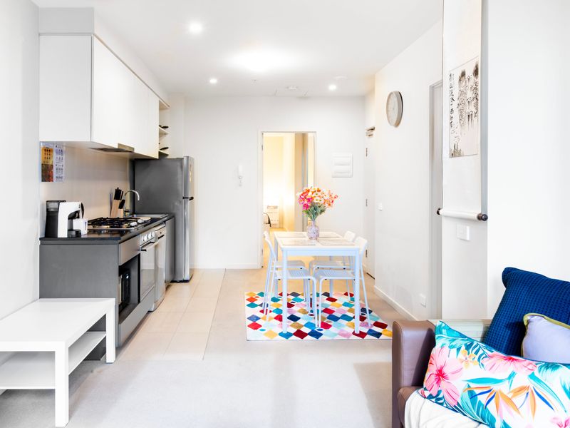 Seamless living: Dine, unwind, and create in our open-plan space with kitchen and living room