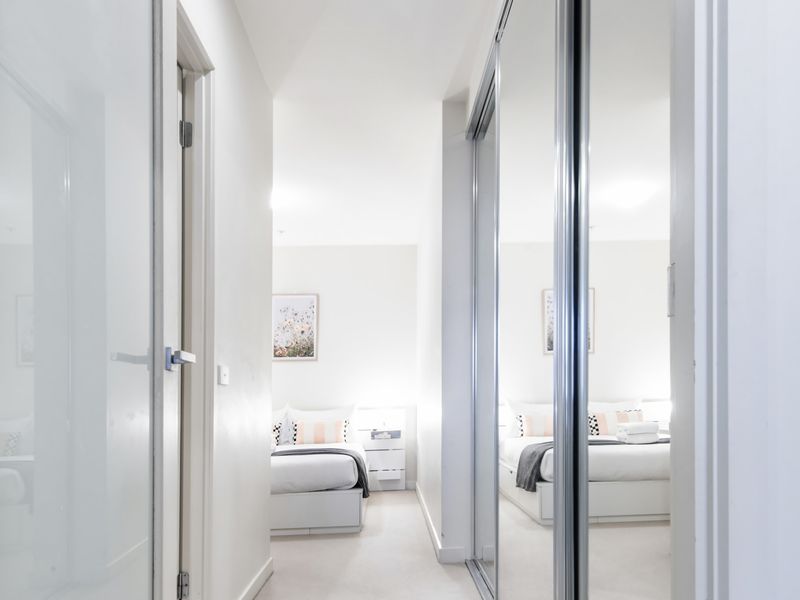 Organize your stay effortlessly with ample clothing storage in our cosy bedroom