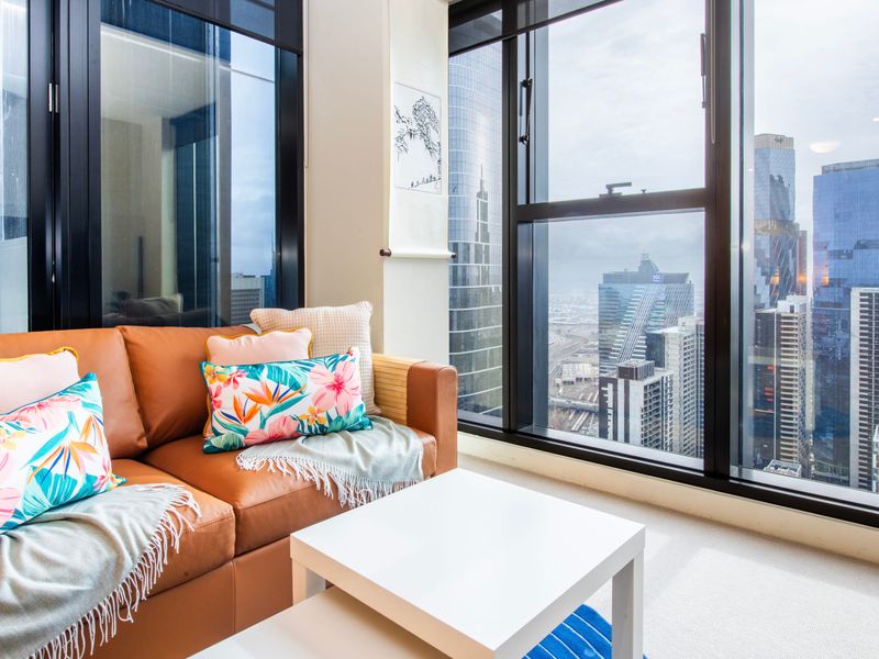 Enjoy panoramic city views from the comfort of our stylish living area