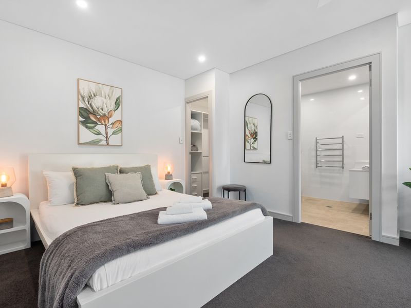 Relax in style with a queen bed, ensuite, and outdoor escape.