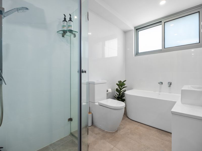 The best of both worlds: shower and tub bliss.