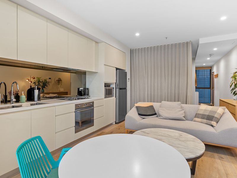 Everything you need, all in one room: Relax, cook, and unwind in this spacious, well-equipped apartment.