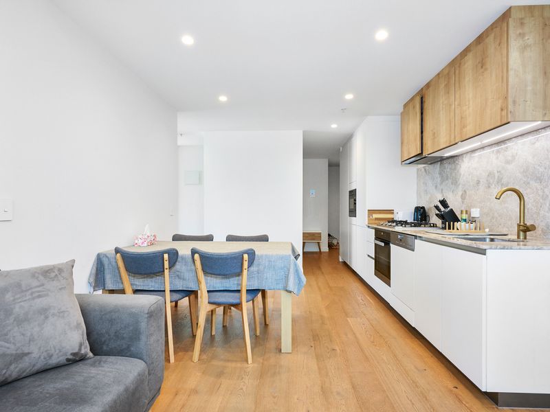 Open plan dining and kitchen filled with natural light