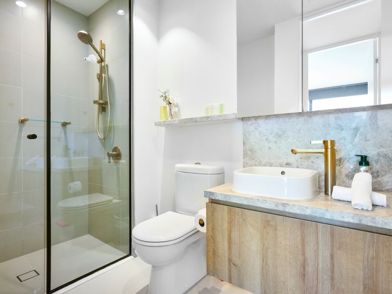 Modern bathroom with walk in shower and premium finishes