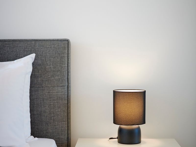 Soft bedside lighting for a warm and welcoming sleep space
