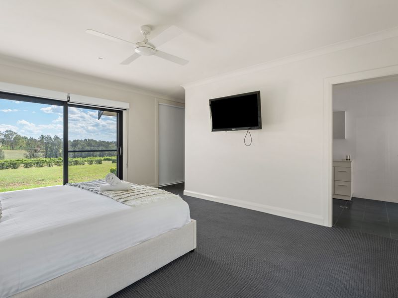 Master bedroom with your very own flatscreen TV and ensuite