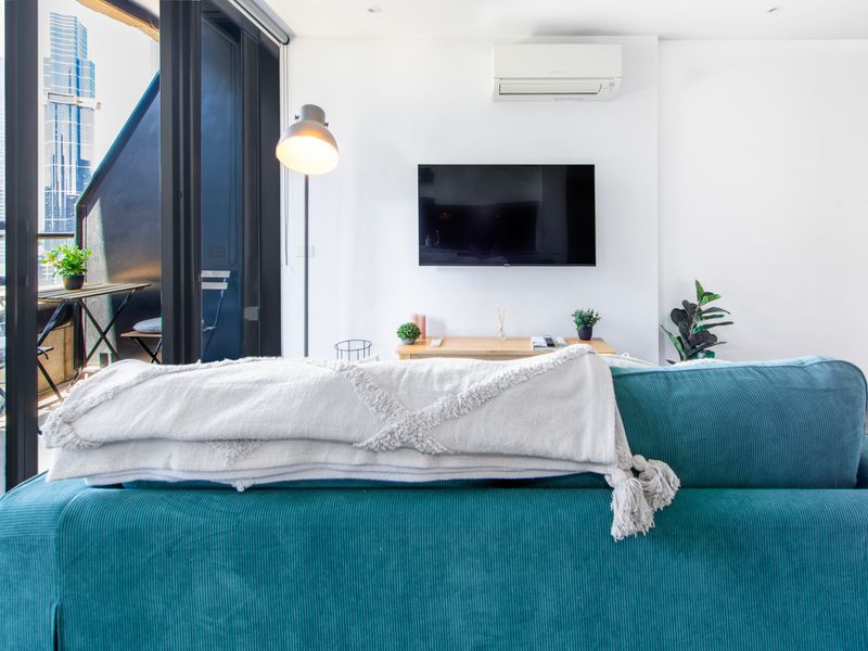 Bright living space flowing to the balcony