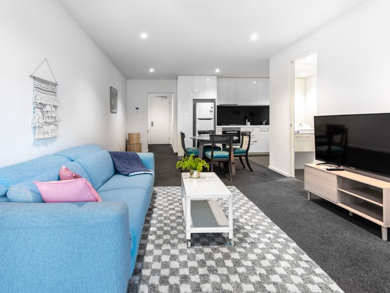 Cozy and modern living area with TV