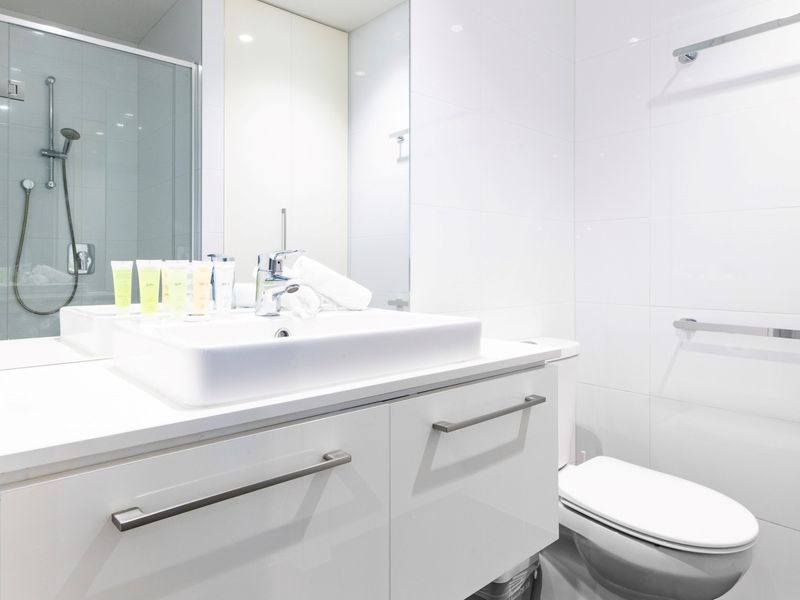 Toilet with bathroom essentials