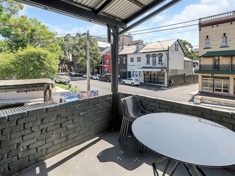 Outdoor seating to relax and enjoy the vibrant neighbourhood.