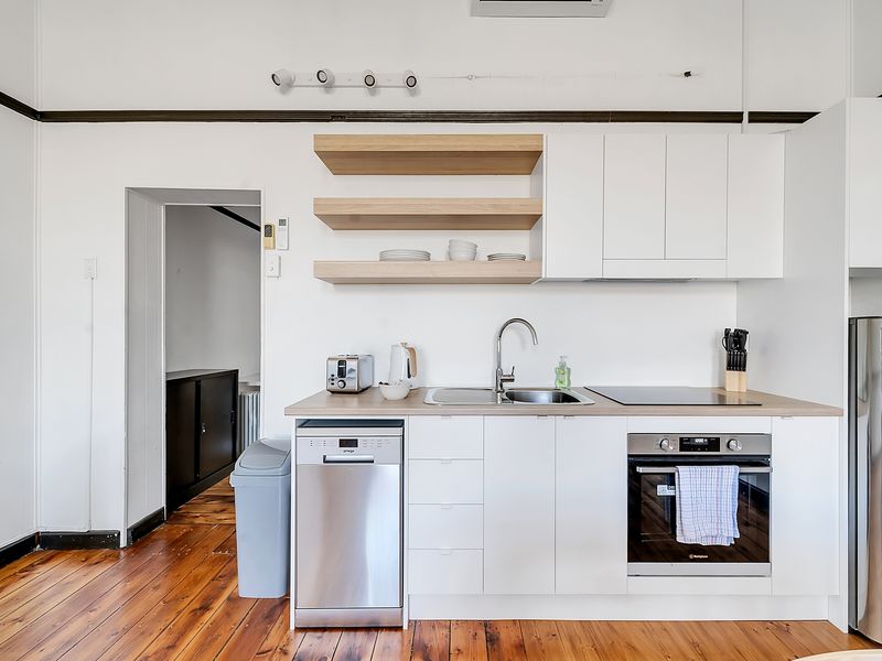 Thoughtfully designed kitchen featuring both functionality and style.