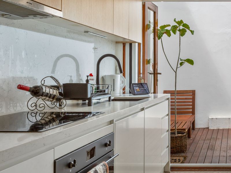 Fully equipped kitchen with stove, oven, sink, and all the cookware you need.