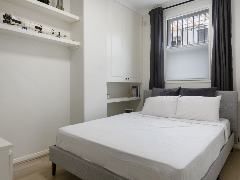 Sleep soundly in this inviting bedroom featuring a queen bed.