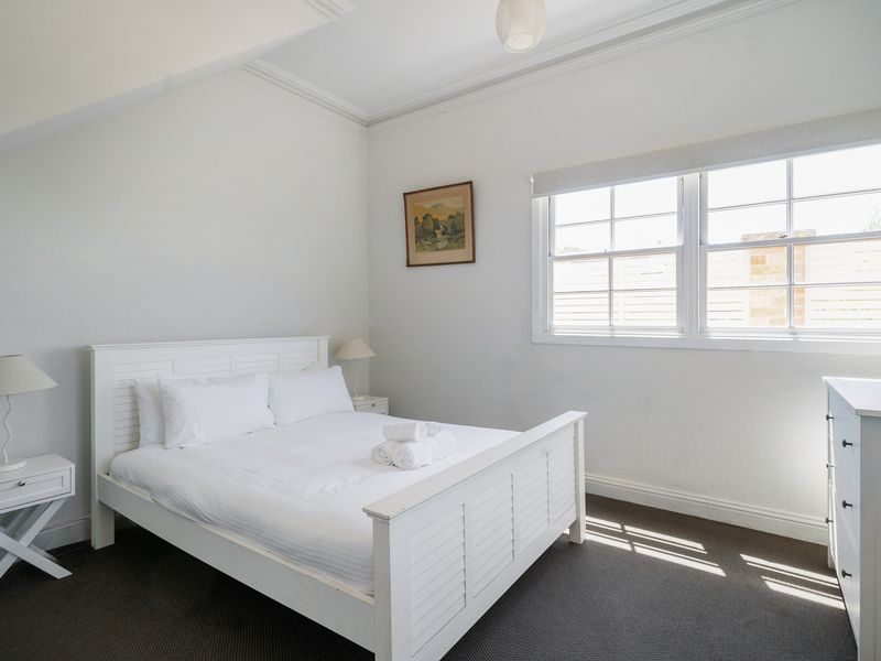 Simple elegance with a spacious layout and soft decor.