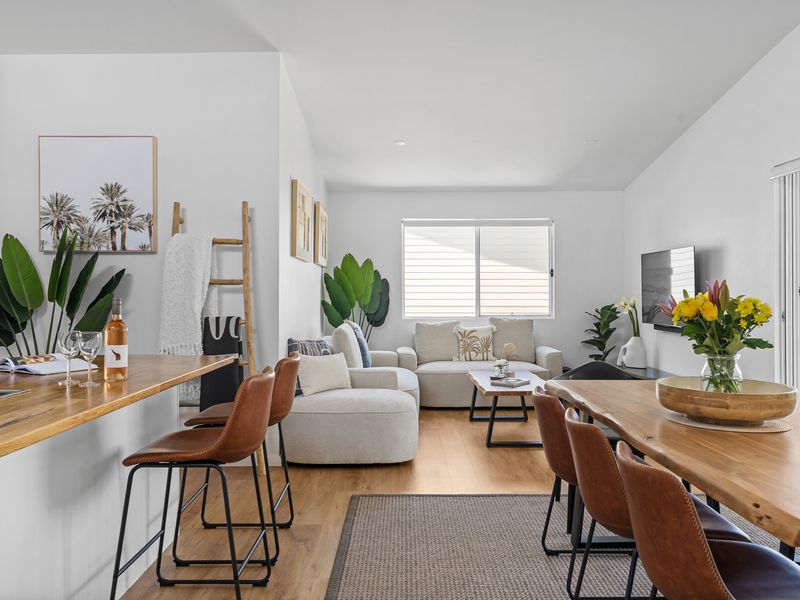 Gather around the spacious kitchen island, perfect for casual meals, drinks, or enjoying good company while preparing your favorite dishes.