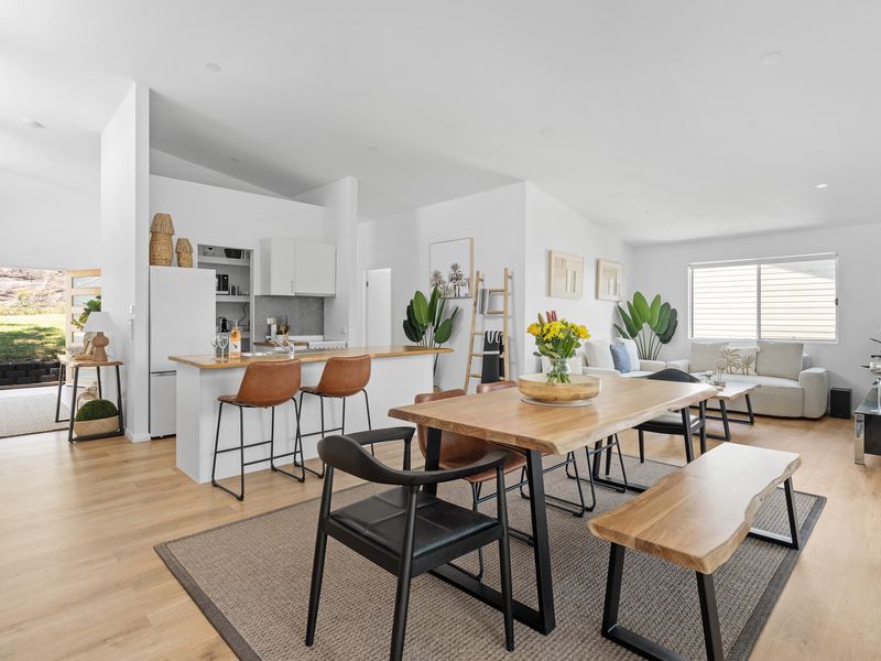 Experience the perfect blend of style and functionality in this open-plan space, where the modern kitchen, elegant dining area, and cosy living room flow seamlessly together for easy living and entertaining.