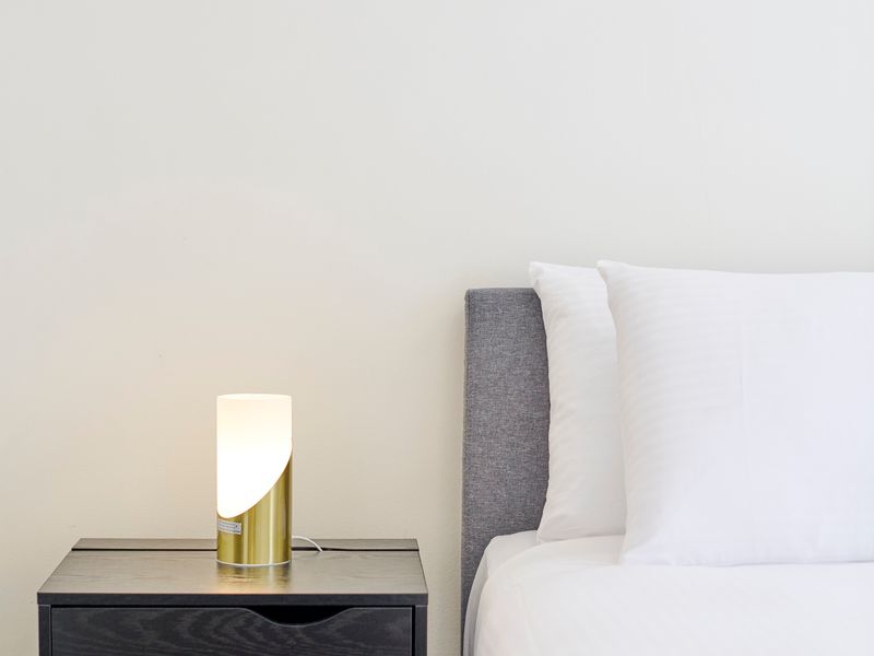 Small, thoughtful details in the bedroom add warmth and character
