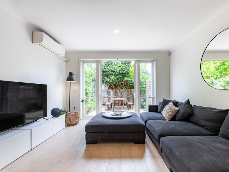 Spacious and Elegant Living Area with TV