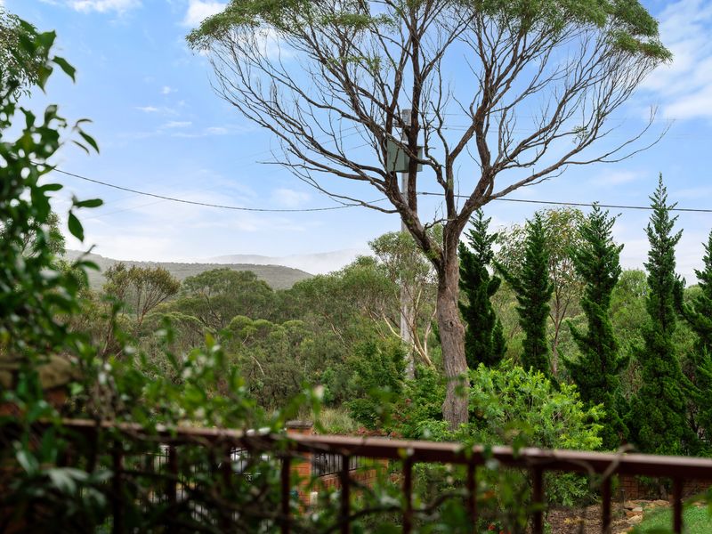 Enjoy the serene landscape and distant mountain views right from your doorstep.