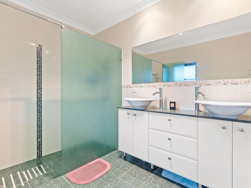 Relax in style with a spacious bathroom and shower.