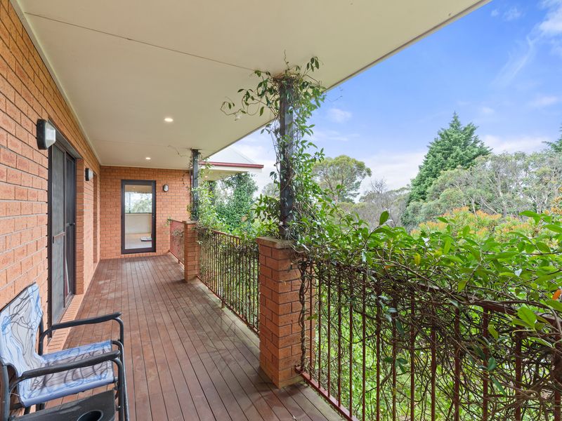 Relax and take in the beautiful views from the charming outdoor balcony.