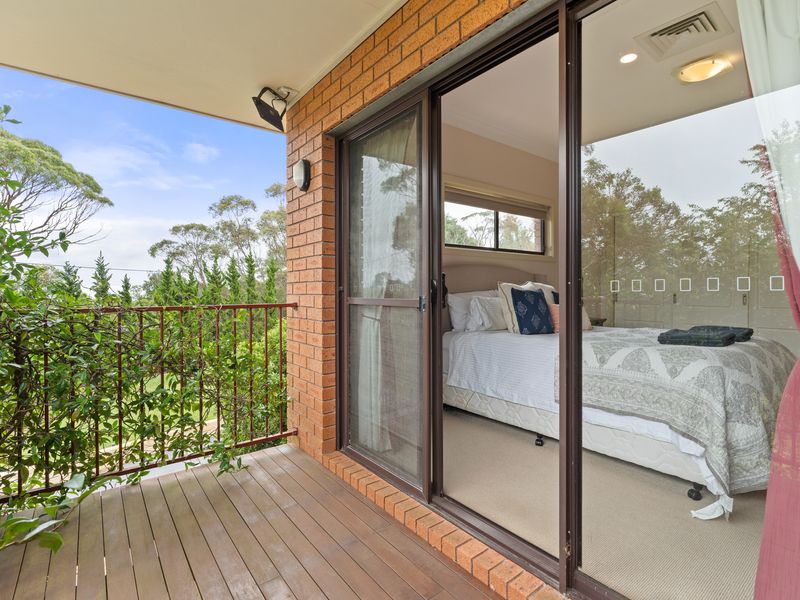 Step out onto the private balcony for a peaceful view of the surrounding greenery and nature.