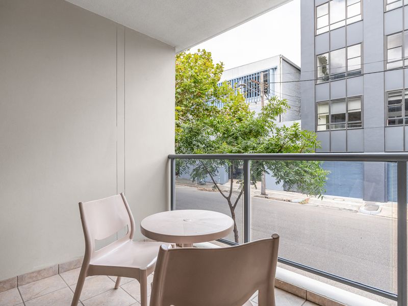 Relax & Unwind – A cozy outdoor space perfect for reading, dining, or simply taking in the city atmosphere.