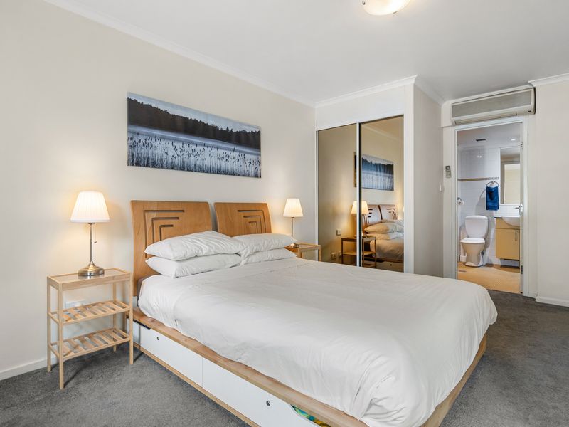 Spacious & Relaxing – A well-designed bedroom with storage space and a calming colour palette.