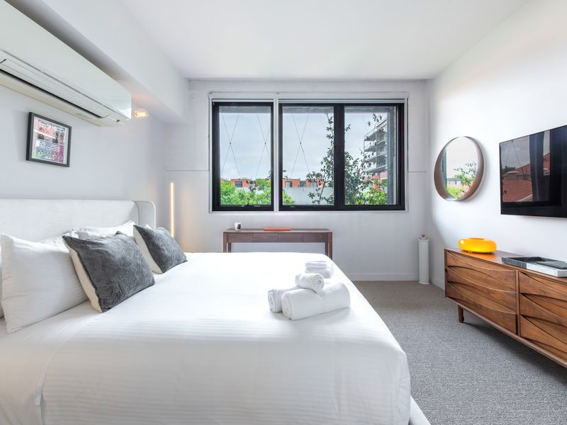 Wake up refreshed in this beautifully lit bedroom, where natural light pours in, creating a serene and peaceful atmosphere for a restful night’s sleep.