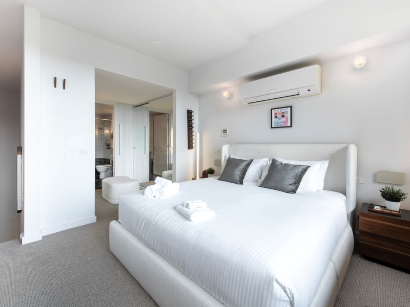 Sleep like royalty in the spacious king-sized bed, dressed in fresh linens for ultimate comfort.