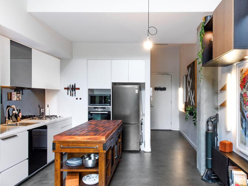 Whip up your favorite meals in this sleek, fully-equipped kitchen — perfect for foodies and home cooks alike!"